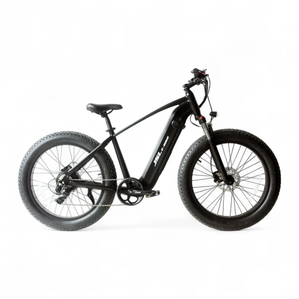 A hardtail e-mountain bike on a light forest trail