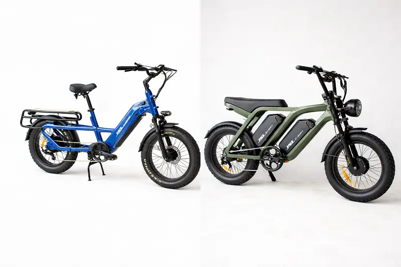 A stylish city e-bike next to a rugged cargo e-bike